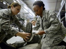Staff Sgt. Lacy Owens, 86th Medical Operations Squadron medical technician, helps Tech. Sgt. Ambree Evans, 86th Aerospace Medical Squadron bioenvironmental technician, wrap a splint during a self-aid and buddy care rodeo July 10 on Ramstein.