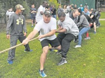 Photo by Staff Sgt. Alexander A. BurnettSoldiers from the 21st Theater Sustainment Command’s Headquarters and Headquarters Company, 
21st Special Troops Battalion, engage in a tug-of-war battle during the 21st STB’s organizational day Sept. 12 at Pulaski Park on Vogelweh. The organizational day was hosted to promote unit cohesion and family fun within the unit.