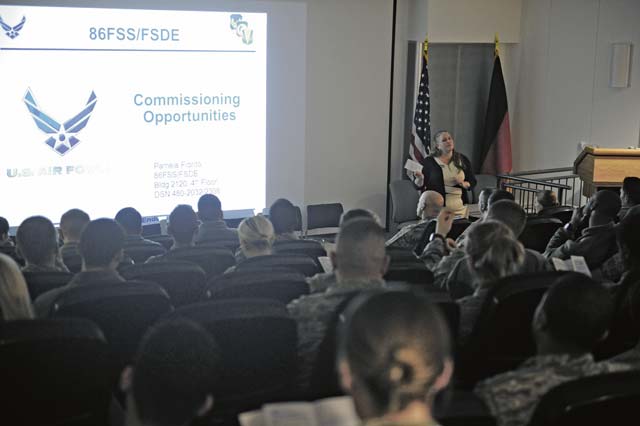Pamela Fiorito, 86th Force Support Squadron education services specialist, speaks to Airmen about the opportunities available to them for their commissioning journey during a town hall briefing Dec. 10 on Ramstein.