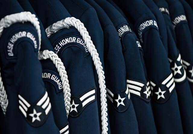 Photo by Senior Airman Jonathan StefankoBase honor guard uniforms hang in a row Feb. 19, 2014, on Ramstein. The U.S. Air Force Honor Guard’s mission is to represent Airmen to the American public and the world. The honor guard’s vision is to ensure a legacy of Airmen who promote the mission, protect the standards and preserve the heritage.