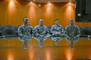 Ramstein Airmen listen to the chief of staff of the Air Force, Gen. Mark A. Welsh III, as he responds to questions during a video conference Jan. 16.