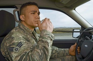 Senior Airman John Kalilikane, 86th Operations Support Squadron airfield management shift lead, communicates with the air traffic controllers Feb. 18 in order to get permission to drive on and inspect the runway.