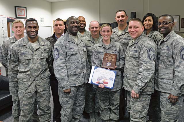 Courtesy photo Staff Sgt. Suzanne Butler receives the Chiefs’ Sharp Award U.S. Air Forces in Europe and Air Forces Africa commander’s support staff technician, is the recipient of the Sharp Award.