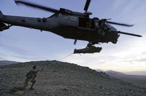 Members of the 83rd Expeditionary Rescue Squadron Guardian Angel transport a patient using an HH-60G Pave Hawk during a mission outside of Bagram Airfield, Afghanistan, March 12, 2013. The 83rd ERQS Guardian Angel’s mission is to rescue, recover and return American or allied forces in times of danger or extreme duress. 