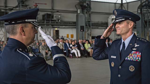 Photo by Airman 1st Class Jordan CastelanLt. Gen. Darryl Roberson, 3rd Air Force commander, returns a salute to Lt. Col. Mike Mench, U.S. Air Forces in Europe and Air Forces Africa band commander, during the 3rd Air Force assumption of command ceremony June 11.