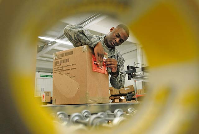 Airman 1st Class Terrelle Green, 86th Logistics Readiness Squadron traffic management technician, packages equipment for outbound shipping Sept. 25 on Ramstein. Green is a member of the Deployment and Distribution Flight, which shipped more than 130,000 packages in the last calendar year.