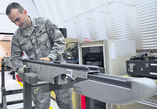 Staff Sgt. Timothy Emerick, 86th Materiel Maintenance Squadron aircraft armament systems technician, prepares to test a missile launcher attachment Sept. 6 on Ramstein. The 86th MMS Airmen store, maintain and account for WRM equipment for deployments downrange.