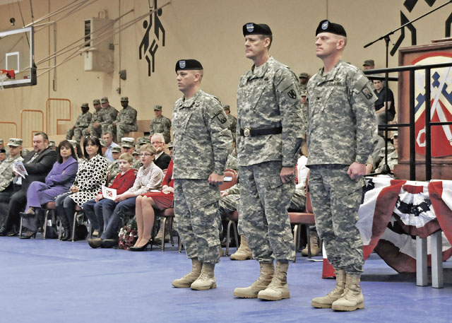 Col. J. Scott Murray, incoming commander of the 16th Sustainment Brigade, Maj. Gen. John R. O’Connor, commanding general of the 21st Theater Sustainment Command, and Col. Darren Werner, outgoing commander of the 16th Sust. Bde., stand in formation during a change of command ceremony Dec. 11 on Smith Barracks in Baumholder. Werner relinquished command of the 16th Sust. Bde. to Murray after serving as the brigade’s commander for two years.