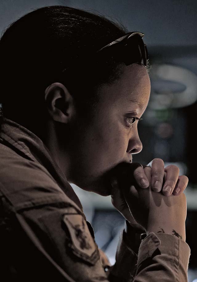 Senior Airman Brooke Walker, Ramstein Fly Away Security Team member, mentally prepares herself for the mission at hand prior to landing in Africa. F.A.S.T. members are responsible for the security of aircraft and aircrews while on unsecured or nontraditional flightlines.