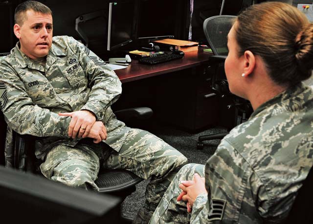Chief Master Sgt. David Oddo, 603rd Air and Space Operations Center superintendent, mentors an Airman Jan. 24 on Ramstein. Oddo has an open-door policy with his Airmen to provide support and get them additional help if needed.
