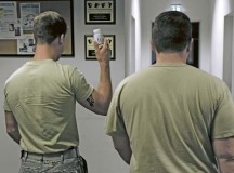 A Ramstein Airman and an observer take a container to the restroom to provide a sample as part of the Drug Demand Reduction Program June 9 on Ramstein. The DDRP provides a way to detect and deter drug use.