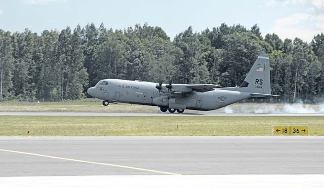 A C-130J assigned to the 37th Airlift Squadron lands on Lielvarde Air Base, Latvia, June 17 as part of the exercise Saber Strike 2014.