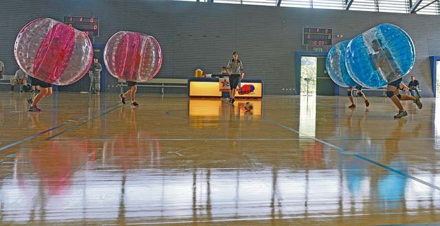 Photo by Senior Airman Holly MansfieldArmy and Air Force service members start a bubble soccer game Sept. 5 on Ramstein. The first Combined Federal Campaign, officially called CFC, was started in 1964. It was conducted in six cities and allows federal employees to donate to charities of their choice to better their communities. 