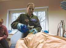 Staff Sgt. Danika Fulham, 86th Aeromedical Evacuation Squadron medical technician, administers a bag-valve mask to assist the breathing on a smart dummy during readiness skills verification training April 12 on Ramstein. The 86th AES is an aeromedical evacuation squadron that provides timely, efficient movement of patients and en route care. This type of evacuation has been used extensively throughout all major wars since World War II and saved countless lives.