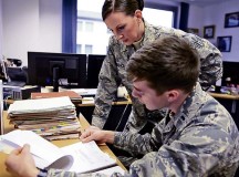 Staff Sgt. Katie McMahon (left), 700th Contracting Squadron contracting officer, and 1st Lt. Matthew Bogan, 700th CONS contracting officer, review a contract Dec. 16 on Kapaun Air Station. McMahon and Bogan work with other contracting officers to ensure Airmen have the resources necessary to complete any mission.