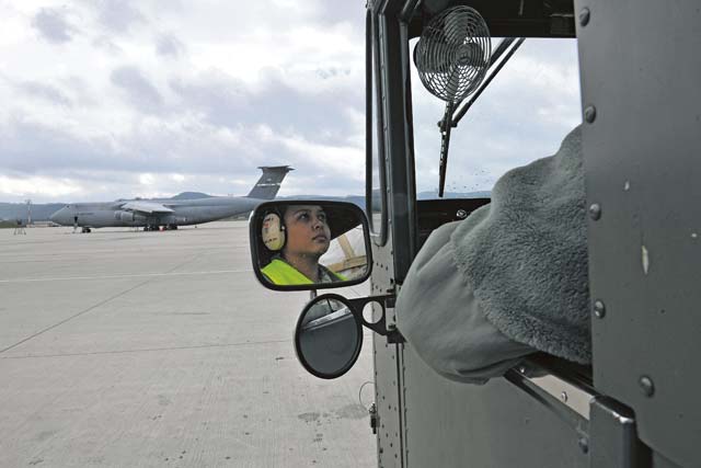 Airman 1st Class Sarah Buena, 721st Aerial Port Squadron ramp service specialist, transports assets on a K-loader during training Sept. 17.