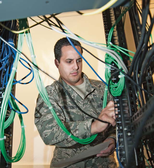 Photo by Airman 1st Class Michael StuartStaff Sgt. Horacio Maysonet, 1st Communications Maintenance Squadron special communications engineer, inspects a training module Oct. 17 on Ramstein.