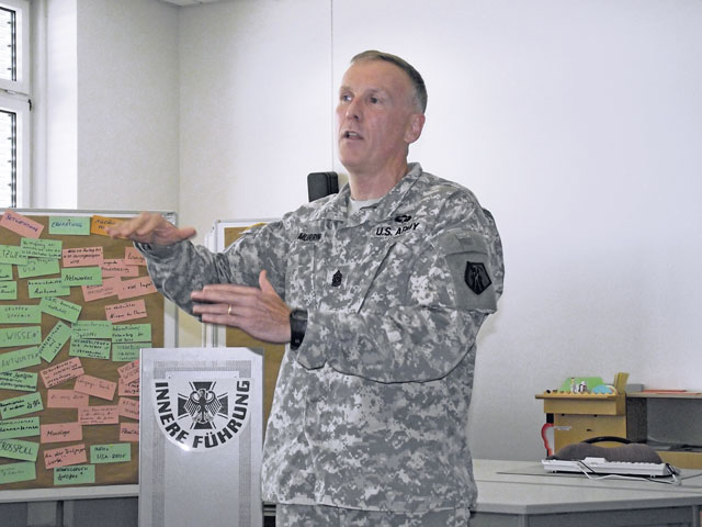 Command Sgt. Maj. Jim Murrin, the acting command sergeant major of the 21st Theater Sustainment Command, fields questions from German information officers during a presentation Aug. 28 at the Center for Leadership Philosophy in Koblenz. The presentation reflected and reinforced the strong bonds among allies, which extend even to training, mentorship and professional discourse.