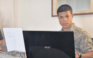 Photo by Kimberly Parker  Airman 1st Class Luis Castro, 86th Logistics Readiness Squadron supply journeyman, uses free WiFi at Club 7 to surf the web on July 25. Club 7 offers games, video games, movies, snacks and home cooked meals on Friday nights. 