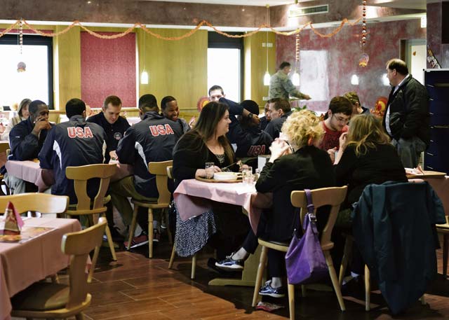 Airmen and their families enjoy a traditional Thanksgiving meal at the Rheinland Inn Dining Facility Nov. 27. The dining facility is open during all major holidays, including Thanksgiving, to ensure Airmen have a place to celebrate while separated from their families.