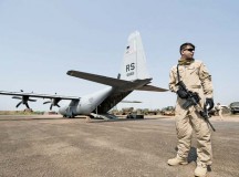 Airman 1st Class Andrew Bracamontes, Ramstein Fly Away Security Team member, stands guard over a C-130J Super Hercules in Central African Republic. F.A.S.T. members are specially trained and equipped security forces personnel deployed to provide security for aircrew and aircraft while stopped in high-threat areas around the globe.