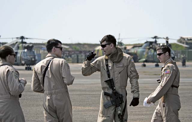 Members of the Ramstein Fly Away Security Team provide security on an airfield, allowing aircrews to perform their tasks safely in Central African Republic, Africa. These teams are designed to fly into unsecured, nontraditional flightlines and ensure security for aircraft and its crew members as they accomplish their mission.