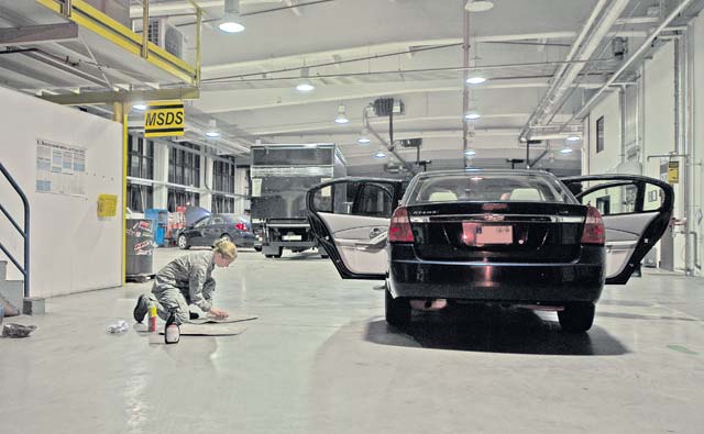 Photo by Senior Airman Damon KasbergMembers of the 86th Vehicle Readiness Squadron inspect a government vehicle. The 86th VRS maintains more than 1,800 vehicles — the largest fleet in the Air Force. From the smallest matter, such as getting a driver’s license, to driving crew buses, the 86th VRS Airmen have their hands in just about everything transportation-related on Ramstein. 