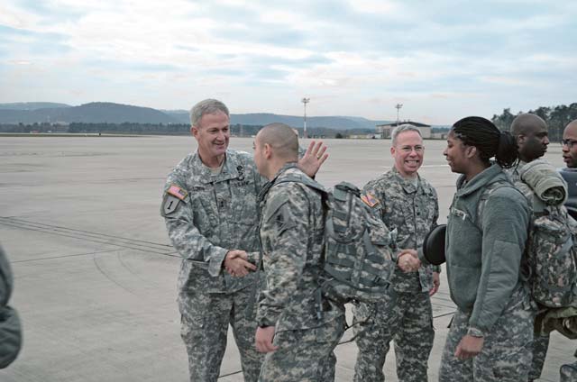 Photo by Staff Sgt. John ZumerU.S. Army Europe Deputy Commanding General Richard Longo joins 10th Army Air and Missile Defense Command leadership in saying goodbye to Soldiers of the 5th Battalion, 7th Air Defense Artillery Regiment Dec. 2 on Ramstein as they leave for a yearlong deployment to Turkey. Almost 200 service members left as part of a continuing NATO mission that will see 5-7 ADA helping to stabilize the region by providing air defense protection against potential ballistic missile threats. Forces from Germany and the Netherlands are also deployed to different sections of Turkey as part of the NATO effort.