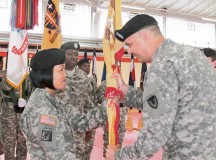 Courtesy photoCol. William Bailey (right), 409th Contracting Support Brigade 
commander, passes the colors to Lt. Col. Daryl (Gwen) Devera-Waden, 
903rd Contingency Contracting Battalion incoming commander, during a change of command ceremony June 20 in Kaiserslautern. Devera-Waden took command from Lt. Col. Lynda Royse, who relinquished command of the the 903rd CCBn. after three years of continuous leadership. Royse’s next assignment will be at the Pentagon where she will be working as part of the joint staff.