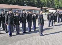 Photo by Staff Sgt. Warren W. Wright Jr.Soldiers with the 21st Theater Sustainment Command prepare to conduct an inspection of their Army service 
uniforms during a 21st TSC Millrinder Day inspection July 3 on Panzer Kaserne in Kaiserslautern.