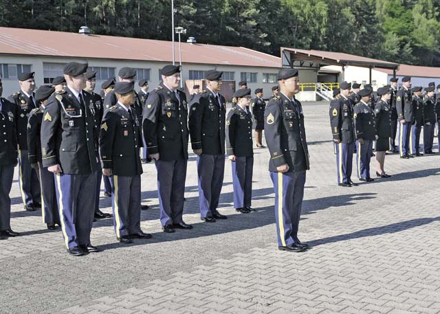 Photo by Staff Sgt. Warren W. Wright Jr.Soldiers with the 21st Theater Sustainment Command prepare to conduct an inspection of their Army service  uniforms during a 21st TSC Millrinder Day inspection July 3 on Panzer Kaserne in Kaiserslautern.