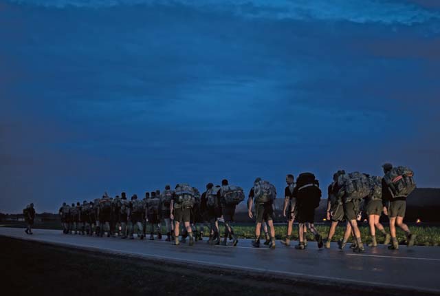 Photo by Senior Airman Damon KasbergAirmen of the 435th Security Forces Squadron participate in a ruck march Aug. 15 on Ramstein. The event started with a run from Pulaski Barracks to Ramstein and ended with a march to their newly completed complex. The 12.2-kilometer event commemorated the 435th SFS’s heritage, stemming back to the 786th SFS at Sembach Kaserne. The 435th SFS not only deploys around the world in support of a variety of operations, they also play a vital role in training other security forces members in advanced tactics and procedures.