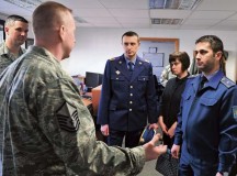 Master Sgt. Etienne P. Tousignant, 86th Force Support Squadron First Term Airmen Course instructor, briefs visitors from the Ukrainian military on the importance of introducing new Airmen to the Air Force and the base March 5 on Ramstein.
