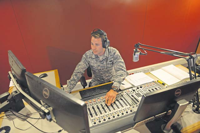 Senior Airman Eli Smith, American Forces Network Kaiserslautern broadcast journalist, DJs a radio morning show Sept. 10 on Vogelweh. AFN Kaiserslautern has provided service to military members since 1954.