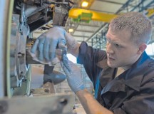Photo by Airman 1st Class Jordan CastelanSenior Airman Austin Payne, 86th Aircraft Maintenance Squadron aerospace propulsion technician, cleans and applies lubrication during a repair on Ramstein. Payne and other 86th AMXS Airmen replaced a prop shaft adapter on a C-130J Super Hercules.