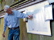Wolfgang Wuermel, owner of the Kindsbach Cave, details a map of the Air Defense Operations Center bunker Aug. 16 in Kindsbach. The bunker was built prior to World War II and was utilized for command and control operations for the German army. After the war, it was passed to the French, who used it primarily for storing munitions. The U.S. Air Force gained control of the bunker in 1954 and turned it back into a command and control center where air operations could have been led if the Cold War turned hot.