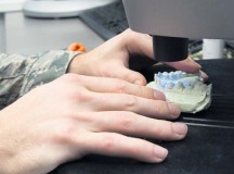Tech. Sgt. Charles Davis, 86th Dental Squadron fixed element leader, places a mold of a patient’s mouth into a 3-D scanner to use software to design and mill a crown Oct. 29 on Ramstein. The computer assisted design and manufacture of dental crowns enables dentists to have crowns finished in one day instead of 28 days.