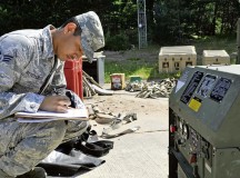 Senior Airman Denis Reyes-Cruz, 1st Combat Communications Squadron electrician, performs a check on a generator during a training exercise July 10 on Ramstein. The exercise was held in order to ensure Airmen can perform the mission outside of a normal training environment.