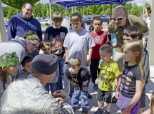 Staff Sgt. Jeffery Fitzgerald, 86th Security Forces Squadron training instructor, shows the barb from a training Taser cartridge to a crowd during the 86th SFS Police Week display May 17 on Ramstein. The event occurred during National Police Week and was held to provide community involvement and safety tips. The 86th SFS assembled the displays and demonstrations to provide community members the opportunity to gain first-hand knowledge of what security forces does on Ramstein. 
The 86th SFS also gave lethal and less-than-lethal weapon safety tips while providing community involvement.