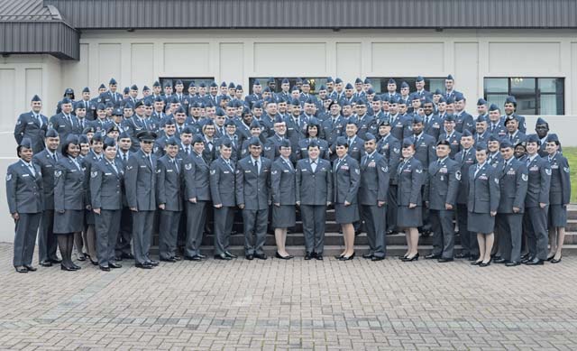 Photo by Senior Airman Jonathan StefankoCommunity College of the Air Force graduates pose for a group photo Nov. 7 on Ramstein. The class consisted of a total of 395 enlisted Air Force members, the largest CCAF graduating class in Ramstein history.