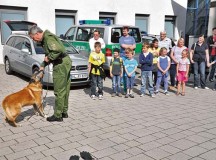 Courtesy photo
A police officer demonstrates his work with a police dog during a previous open house at the Westpfalz Police Headquarters in Kaiserslautern.