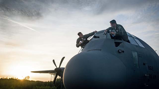 Photo by Airman 1st Class Jordan CastelanMaj. Jeff Bliss (right) and Capt. Brett Polage, 37th Airlift Squadron pilots, wash the windows of a C-130J Super Hercules May 17, 2014, at Riga International Airport, Latvia, after air-dropping American and Lithuanian service members over Lithuania. Pilots and loadmasters from the 37th AS, alongside an 86th Aircraft Maintenance Squadron flying crew chief, spent four days across three Baltic countries assisting in personnel drops of allied partners and American service members.