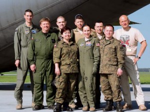 Courtesy photo illustrationRamstein Airmen from the 86th Aeromedical Evacuation Squadron and 435th Contingency Response Group pose for a photo with the Polish AE  team May 9 at Powidz Air Base, Poland.