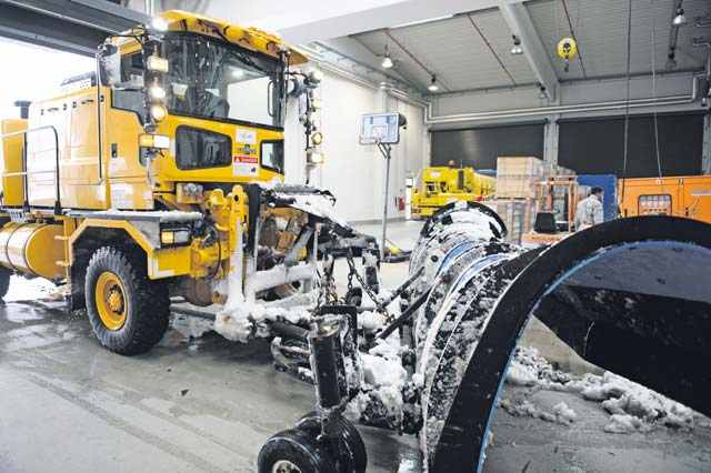 Airmen from the 786th Civil Engineer Squadron heavy equipment shop bring their vehicles in for repairs after plowing the Ramstein flightline  Dec. 3. The heavy equipment shop sprang into action as the first snow of the season hit the ground to ensure the mission continued.
