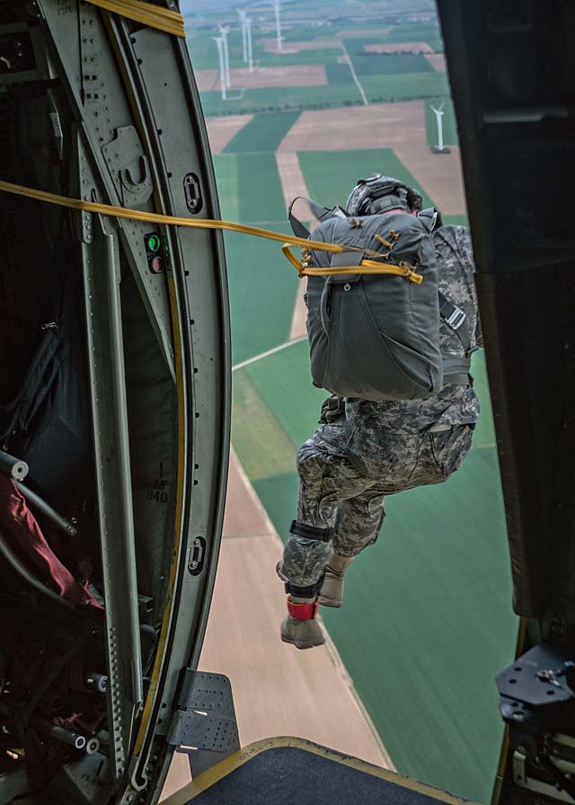 Photo by Airman 1st Class Jordan CastelanU.S. Army Sgt. Jordan Markel Witz, 5th Quartermaster Theater Aerial Delivery Company jumpmaster, exits a C-130J Super Hercules as part of International Jump Week over Germany May 6, 2014. A total of 97 foreign and allied partners tested, built and strengthened partnerships during jump week alongside American Airmen and Soldiers.