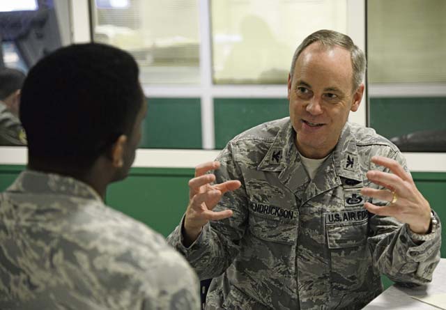 Photo by Senior Airman Timothy MooreCol. Gordon Hendrickson, U.S. Air Forces in Europe director of Intelligence, speaks with Capt. Ty Axson, USAFE chief of Current Intelligence, Surveillance and Reconnaissance Operations-Europe, during a senior leader to company grade officer speed mentoring event Tuesday on Ramstein. Senior leaders from around the KMC mentored CGOs on various subjects, including career progression and networking. 