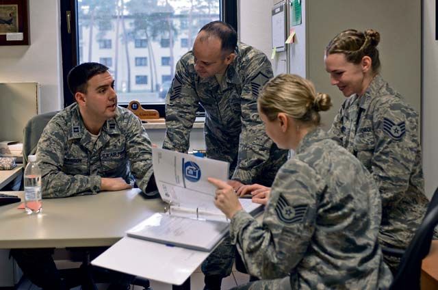 Capt. Ryan Garrison, 86th Medical Support Squadron medical laboratory OIC, discusses procedures with medical laboratory leadership in order to prepare the flight for an upcoming accreditation inspection Jan. 22.