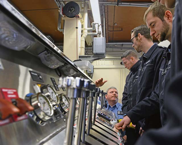 Bundeswehr firefighters familiarize themselves with the basic components of a base fire truck during an exercise on Ramstein.