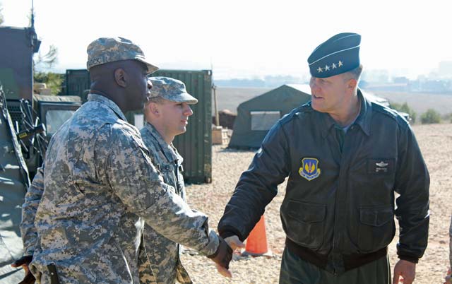 Photo courtesy of the U.S. ArmySoldiers from the 5th Battalion, 7th Air Defense Artillery Regiment, 10th Army Air and Missile Defense Command greet U.S. Air Force Gen. Frank Gorenc, commander of NATO Allied Air Command, during his visit to Gaziantep, Turkey, Jan. 28. The visit allowed Gorenc and the AIRCOM deputy commander, French Lt. Gen. Dominique de Longvilliers, to meet U.S. and Turkish leadership, become familiar with the area of operations, talk with Soldiers, and discuss integration of NATO assets and other resources in helping to protect Turkish civilians from foreign missile threats.