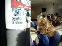Photo by Dijon RolleLiliana Taboas and her mother Lucero Hernandez get a closer look at an African-American history poster during the Black History Month Extravaganza Feb. 20. Members of the garrison’s Equal Opportunity Working Group hosted the event at the Kaiserslautern Military Community Center food court. The poster was just one of several items on display during the community event, which also featured dancing, singing and musical performances.